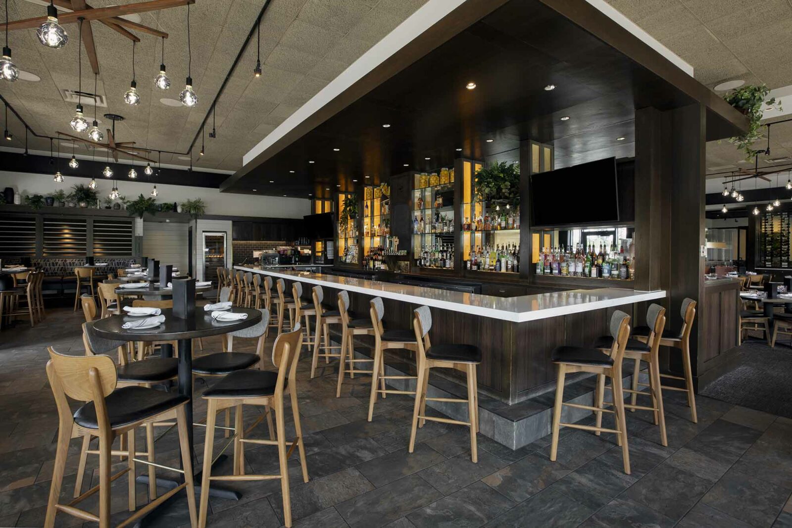 View of the bar and lounge at Burtons Grill in Westford, MA.
